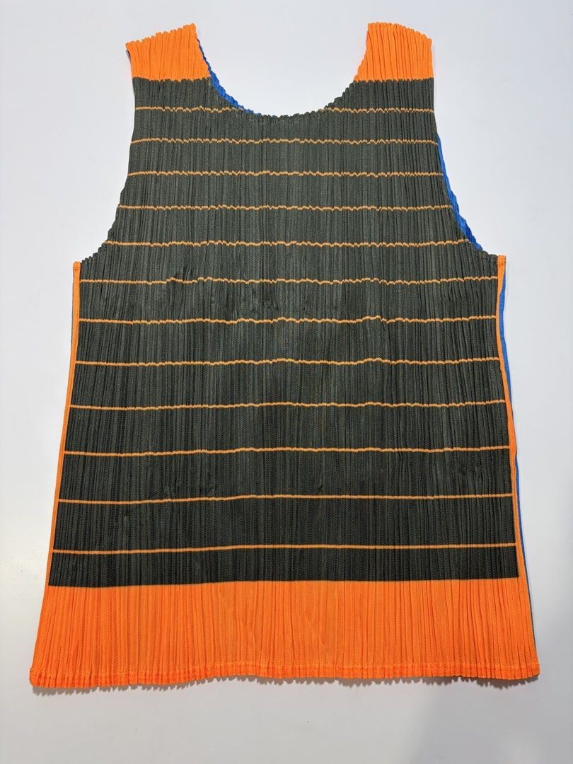 PLEATS PLEASE MULTICOLOR TANKTOP (Category: Sleeveless) located in Manila. Submitted by mnlhappybattle (Listing ID 1462069725, Image 1). Description: PLEATS PLEASE MULTICOLOR TANKTOP Good Condition Tagged size: 4 Length - 20” Width - 13.5”.