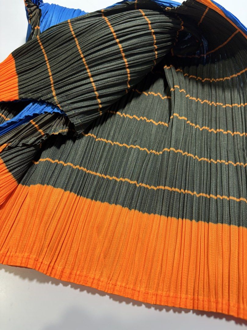 PLEATS PLEASE MULTICOLOR TANKTOP (Category: Sleeveless) located in Manila. Submitted by mnlhappybattle (Listing ID 1462069725, Image 3). Description: PLEATS PLEASE MULTICOLOR TANKTOP Good Condition Tagged size: 4 Length - 20” Width - 13.5”.