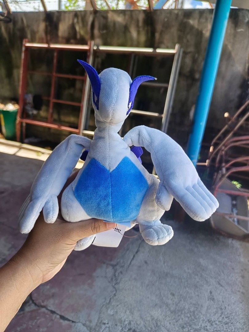 Pokemon Rocket Monsters Lugia Plush Toy (Category: Plushies & Soft Toys) located in Daet. Submitted by heracaramel (Listing ID 1462245316, Image 1). Description: - Adorable Lugia plush toy - Part of the popular Rocket Monsters line - Made with soft, cuddly material - Ideal for any Pokemon enthusiast - Suitable for both display and playtime - A must-have collectible!.