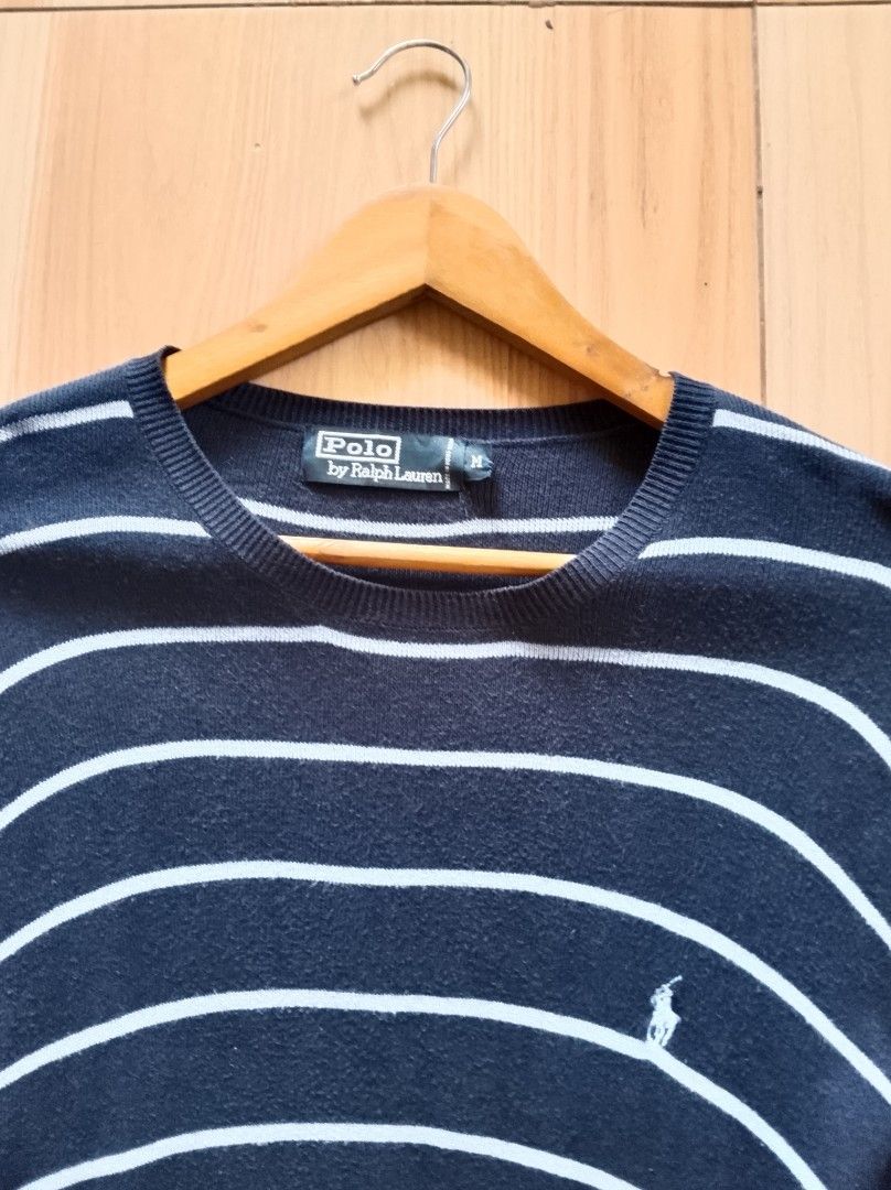 Polo by Ralph Lauren Striped Sweater (Category: Coats, Jackets and Outerwear) located in Bogo. Submitted by algarme2018 (Listing ID 1462070574, Image 2). Description: - Classic navy and white striped sweater - Brand: Polo by Ralph Lauren - Material: 100% Cotton - Style: Long sleeves, crew neck - Perfect for layering or wearing solo - Easy to style for any occasion.