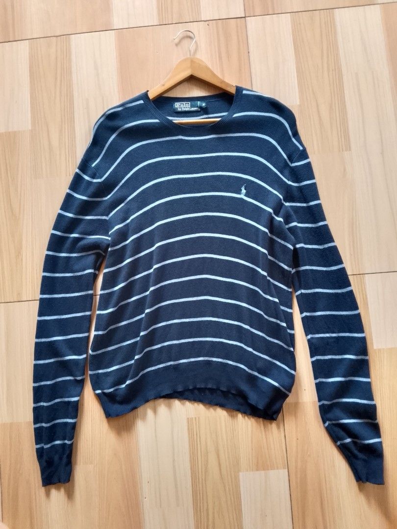 Polo by Ralph Lauren Striped Sweater (Category: Coats, Jackets and Outerwear) located in Bogo. Submitted by algarme2018 (Listing ID 1462070574, Image 1). Description: - Classic navy and white striped sweater - Brand: Polo by Ralph Lauren - Material: 100% Cotton - Style: Long sleeves, crew neck - Perfect for layering or wearing solo - Easy to style for any occasion.