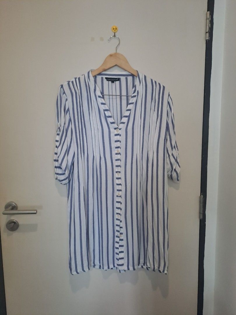 Polo longsleve dress (Category: Dresses) located in Manila. Submitted by joanbalde39643 (Listing ID 1462127401, Image 1). Description: This blue and white vertical striped blouse is from the Club Z Collection line. It features a lightweight, textured cotton-blend weave with a relaxed, coastal-inspired silhouette..