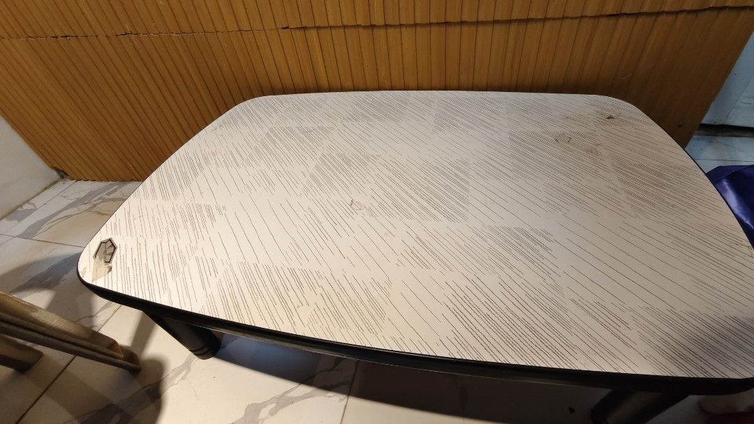 Portable Folding Table for Laptop or Study (Category: Tables & Sets) located in Bulacan. Submitted by babz30261 (Listing ID 1462258065, Image 3). Description: - Compact folding table - Ideal for laptop use or study sessions - Light pattern on surface - Legs fold flat for easy storage - Minor scuffs on surface and edges (expected from use) - Sturdy and suitable for everyday use.