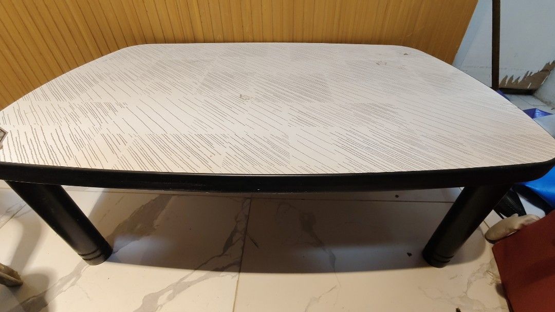 Portable Folding Table for Laptop or Study (Category: Tables & Sets) located in Bulacan. Submitted by babz30261 (Listing ID 1462258065, Image 1). Description: - Compact folding table - Ideal for laptop use or study sessions - Light pattern on surface - Legs fold flat for easy storage - Minor scuffs on surface and edges (expected from use) - Sturdy and suitable for everyday use.
