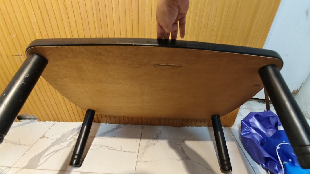 Portable Folding Table for Laptop or Study (Category: Tables & Sets) located in Bulacan. Submitted by babz30261 (Listing ID 1462258065, Image 2). Description: - Compact folding table - Ideal for laptop use or study sessions - Light pattern on surface - Legs fold flat for easy storage - Minor scuffs on surface and edges (expected from use) - Sturdy and suitable for everyday use.