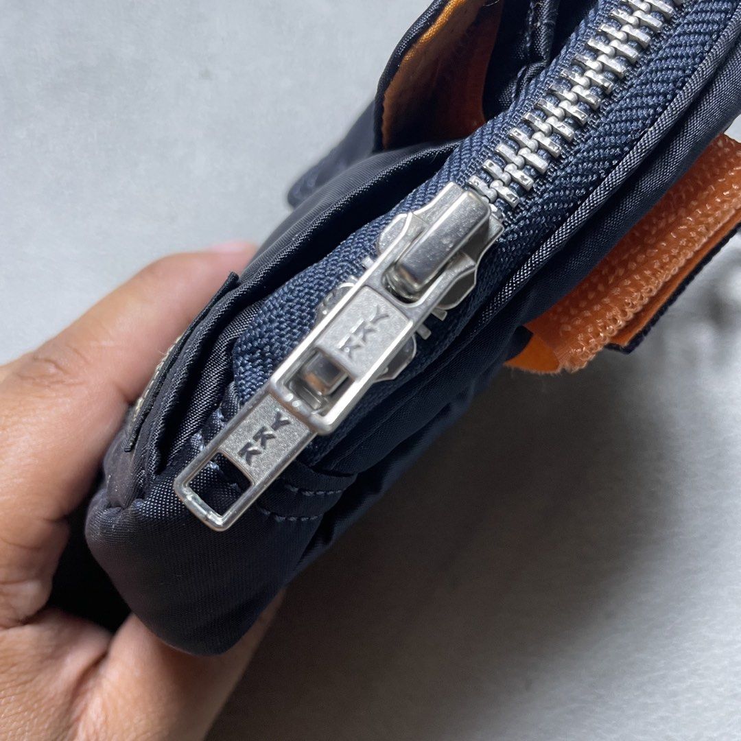 PORTER TANKER MULTI-FUNCTIONAL SMALL BAG (Category: Wallets & Card Holders) located in Manila. Submitted by revise.ph_ (Listing ID 1462218923, Image 3). Description: PORTER TANKER MULTI-FUNCTIONAL SMALL BAG Made in Dimension Height/Length:5.5 Width:4.5 Issue: Price:2,000 Free Shipping via Jnt.