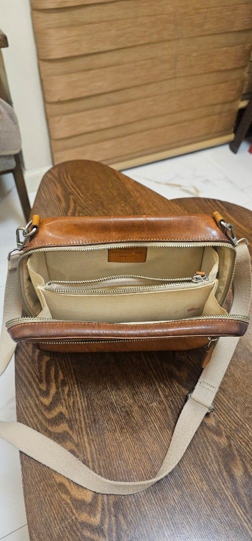 Porter Yoshida & Co. Leather shoulder bag (Category: Sling Bags) located in Navotas City. Submitted by walburst (Listing ID 1462257429, Image 2). Description: Vintage Porter Yoshida & Co. Leather Shoulder Bag Cotton canvas liner Made in Japan Good condition Leather soft and supple (Nice feel to the touch) *patina, scuffs, scratches *strap attachement points repaired *replacement sling strap *minor interior stains.