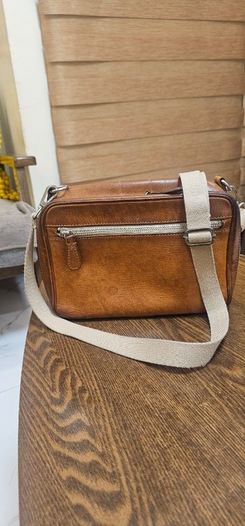 Porter Yoshida & Co. Leather shoulder bag (Category: Sling Bags) located in Navotas City. Submitted by walburst (Listing ID 1462257429, Image 1). Description: Vintage Porter Yoshida & Co. Leather Shoulder Bag Cotton canvas liner Made in Japan Good condition Leather soft and supple (Nice feel to the touch) *patina, scuffs, scratches *strap attachement points repaired *replacement sling strap *minor interior stains.