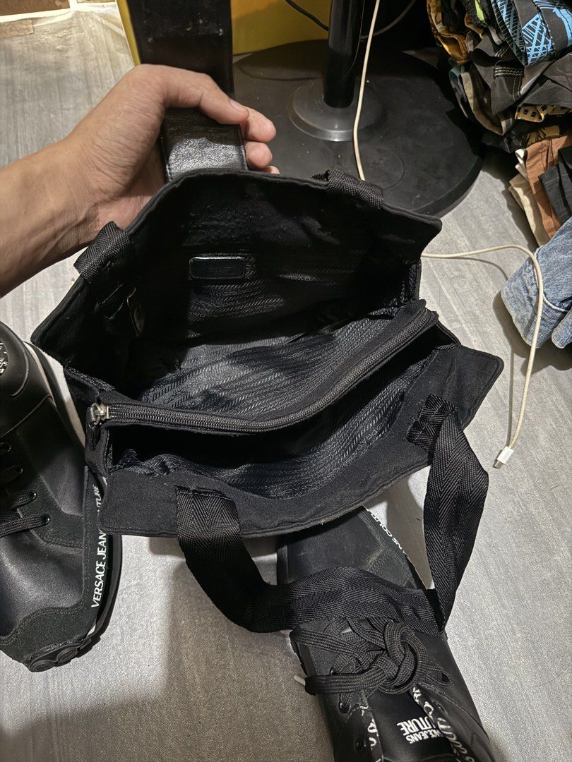 PRADA (Category: Luxury Bags & Wallets) located in Cagayan de Oro. Submitted by twice.but.nice.blackmarket (Listing ID 1462102184, Image 3). Description: Excellent condition Made in Italy on tag! Color rate 9 Sign of use need labhan maraming alikabok Height 9.5 Top Width 11 Bottom Width 12.5.