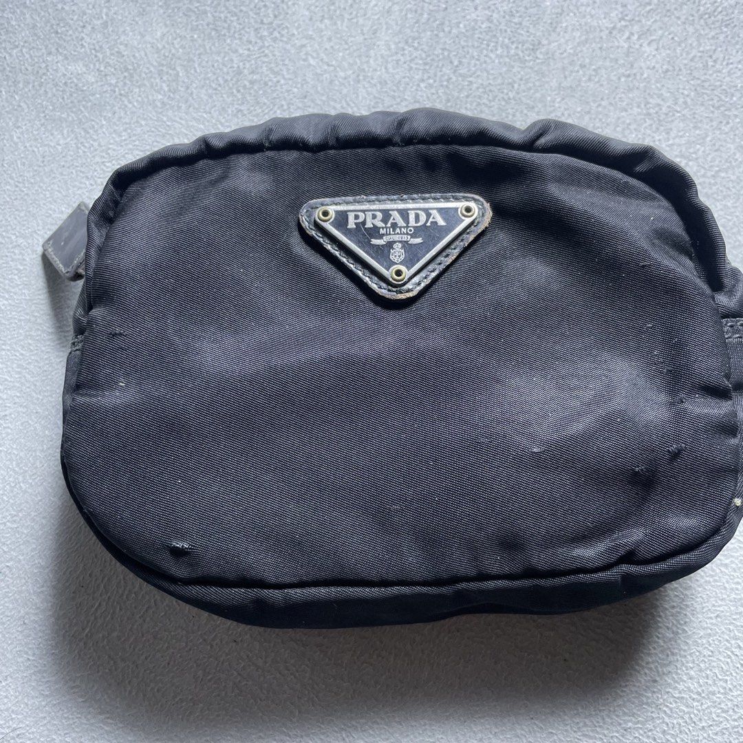 Prada Pouch Wallet (Category: Purses & Pouches) located in Manila. Submitted by revise.ph_ (Listing ID 1462223773, Image 3). Description: Prada Pouch Wallet Made in Italy Height/Length:4 Width:5.8 Side Width:2.3 Issue: scratches check detailed photo Price:2,500 Free Shipping Via Jnt.