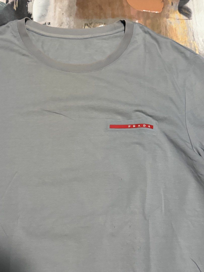 Prada tee (Category: Tshirts & Polo Shirts ) located in Las Pinas. Submitted by thrftmnl. (Listing ID 1462048852, Image 2). Description: Prada tee Size: Large Dimes Width: 22 Length: 29.