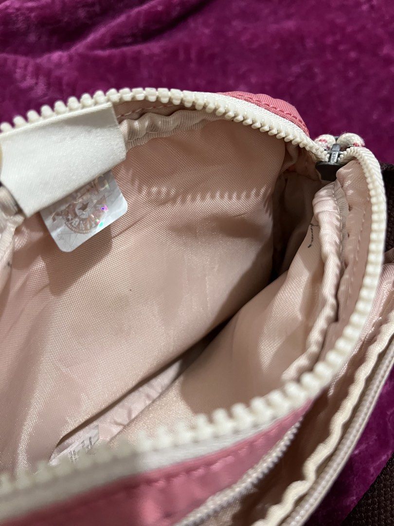 Preloved Authentic Kipling Sisko Small Crossbody Bag (Category: Cross-body Bags) located in Quezon City. Submitted by g0bblyg33kd0m (Listing ID 1462137265, Image 3). Description: 💖 Preloved Authentic Kipling Sisko Small Crossbody Bag 📌 In Valley Duo Pink colorway, featuring a multi-toned pink and cream nylon design with a brown base and adjustable strap 📏 Approximate Size: Width: 7 inches Height: 5 inches 🏷️ PRICE: ₱ 350 📌Guaranteed Authenti