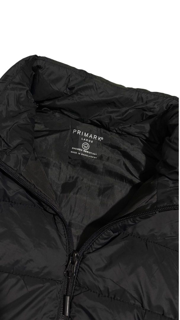 Primark Black Puffer Vest - Size Large (Category: Vests) located in Baguio. Submitted by zeemoda01 (Listing ID 1462169307, Image 2). Description: - Black puffer vest from Primark - Size: Large - Shower resistant, ideal for light rain - Lightweight and easy to pack - Perfect for layering over hoodies or t-shirts - Features a front zip and stand-up collar - Made in Bangladesh.