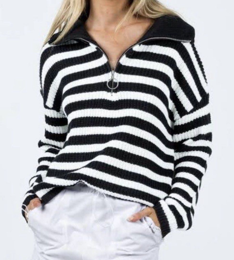 Princess Polly Oversized Zipup Knitted Sweater (Category: Coats, Jackets and Outerwear) located in Binan City. Submitted by myprelovedhaul (Listing ID 1462065296, Image 1). Description: The item in the selected region is a black and white striped quarter-zip knit sweater from the fashion brand Princess Polly. It features a chunky ribbed texture, a prominent black spread collar, drop shoulders, and a silver ring-pull zipper closure..