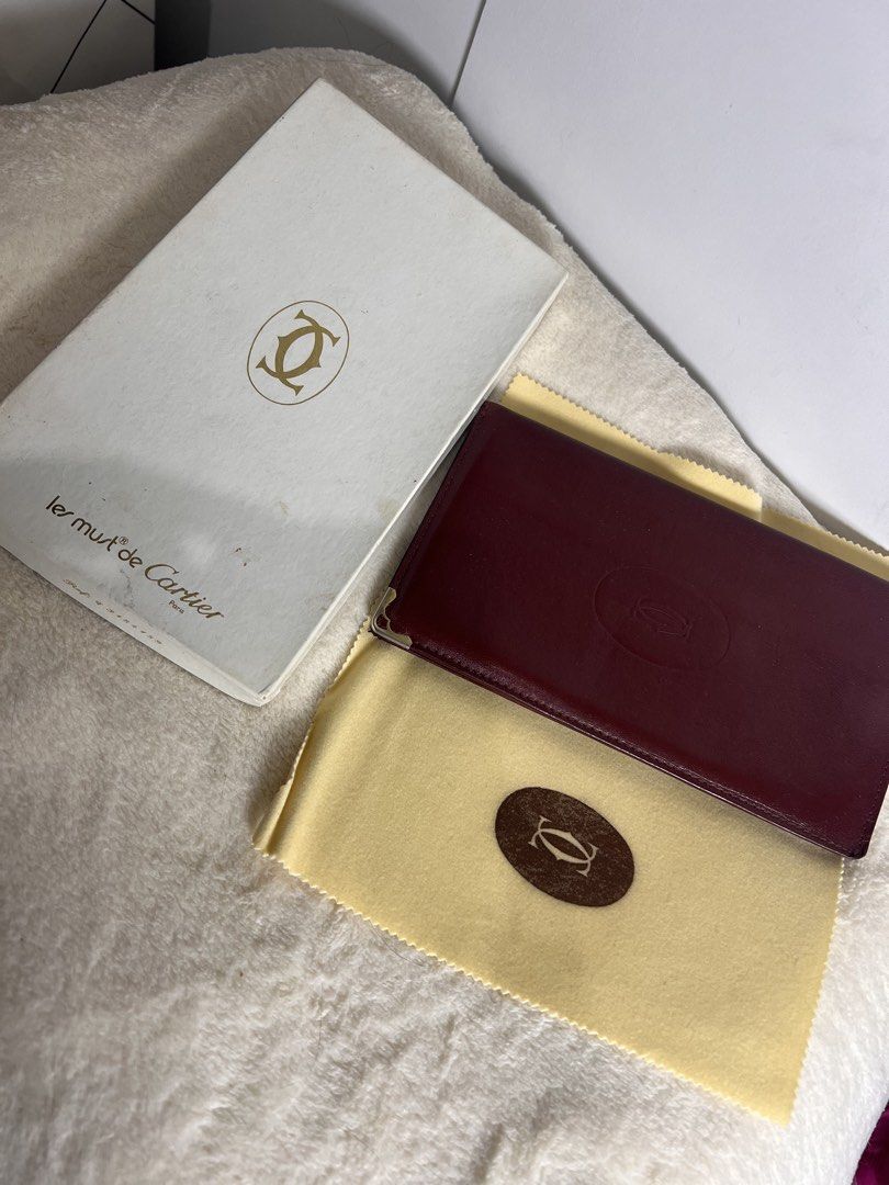 PRLEOVED VINTAGE CARTIER WALLET AUTHENTIC (Category: Luxury Bags & Wallets) located in Makati City. Submitted by carullee (Listing ID 1462196914, Image 1). Description: Vintage Cartier Wallet Guaranteed authentic With box and original dustbag With minimal sign of ageing for a vintage collector item .