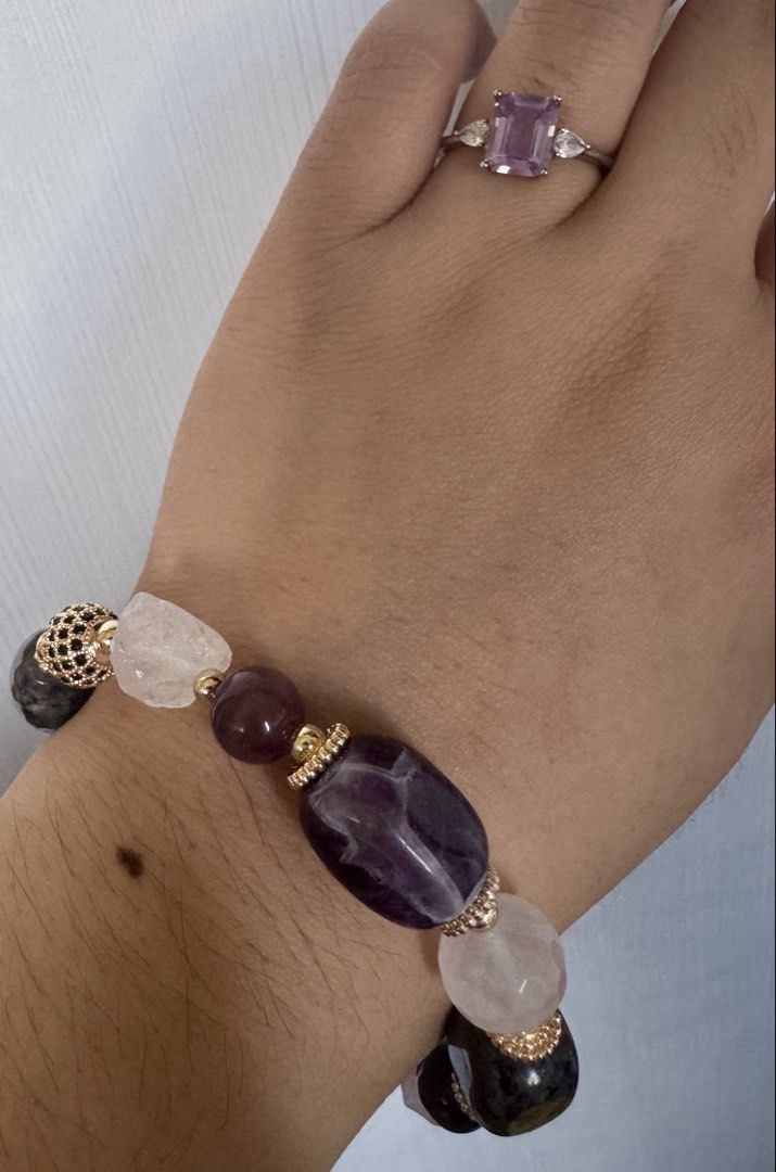 Protection bracelet (Category: Bracelets) located in Quezon City. Submitted by nics006 (Listing ID 1462035630, Image 3). Description: “A powerful crystal blend for clarity, protection & inner balance.” 💜🖤 Benefits: • 🔮 Clear Quartz – clarity & energy amplification • 🖤 Larvikite – grounding & protection • 💜 Amethyst – calm & spiritual balance • ⚫ Black Onyx – strength & emotional stability • 💚 Fluorite – focus & mental clarity A beautiful ev