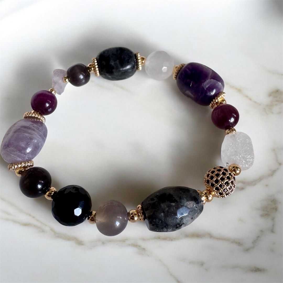 Protection bracelet (Category: Bracelets) located in Quezon City. Submitted by nics006 (Listing ID 1462035630, Image 2). Description: “A powerful crystal blend for clarity, protection & inner balance.” 💜🖤 Benefits: • 🔮 Clear Quartz – clarity & energy amplification • 🖤 Larvikite – grounding & protection • 💜 Amethyst – calm & spiritual balance • ⚫ Black Onyx – strength & emotional stability • 💚 Fluorite – focus & mental clarity A beautiful ev