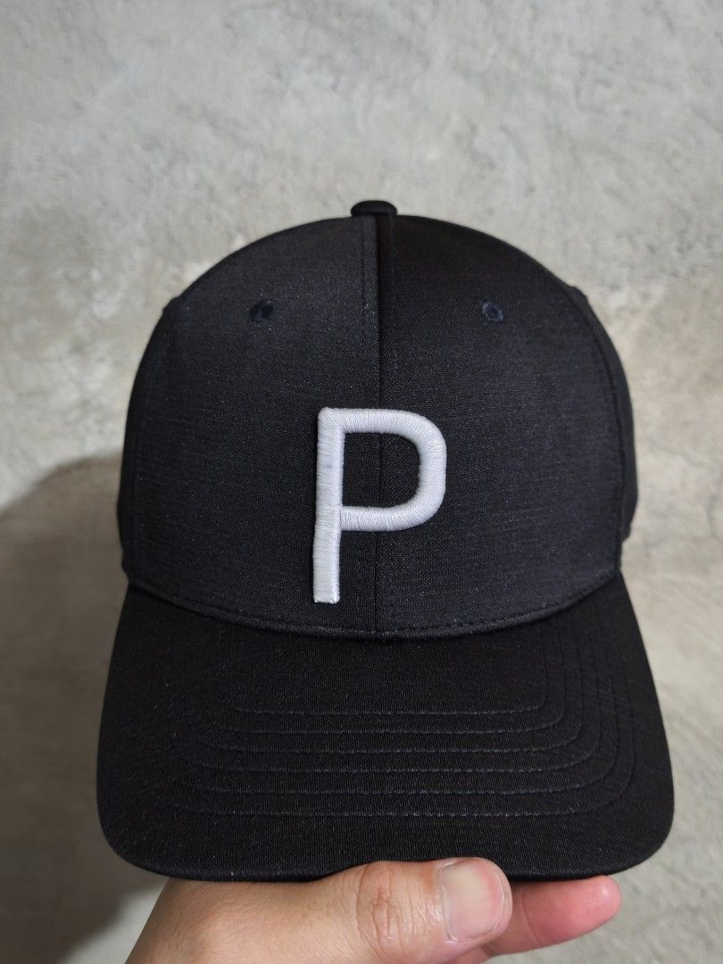 PUMA GOLF HAT (Category: Golf) located in Muntinlupa City. Submitted by themakhatter (Listing ID 1462128767, Image 1). Description: 850 +SF PUMA GOLF HAT ONE SIZE FITS ALL SNAPBACK ADJUSTMENT DRI-FIT MATERIAL IN EXCELLENT 9.5/10 LIKE NEW CONDITION WASHED AND READY TO WEAR.