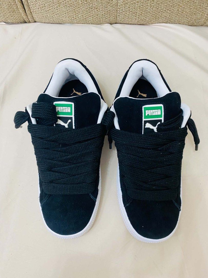 Puma Suede XL Trainers (Category: Sneakers) located in Cabuyao City. Submitted by aj123qt (Listing ID 1462157343, Image 1). Description: Classic black Puma Suede XL sneakers. White accents on the side and sole. Thick black laces. Ortholite insole for comfort. Great for casual wear. Good condition, check photos for details..