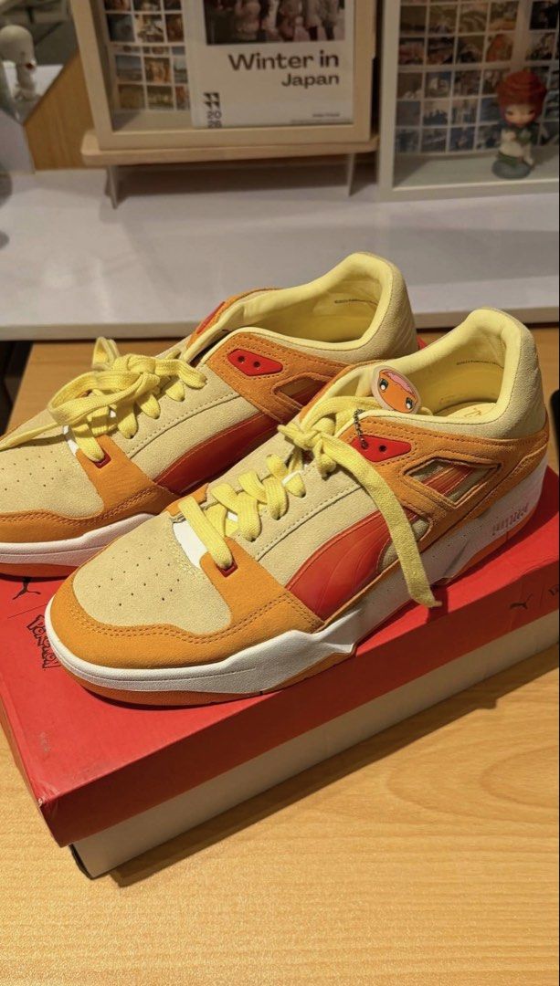 Puma x Pokemon Slipstream Charmander Sneakers (Category: Casual Shoes) located in Santa Maria. Submitted by itsvener (Listing ID 1462078797, Image 1). Description: - Puma x Pokemon Slipstream Charmander sneakers - Colorway: Pale Lemon and Orange - Size: US 10 / UK 9 / EUR 43 - Includes original box and packaging - Ideal for Pokemon and Puma collectors/fans.