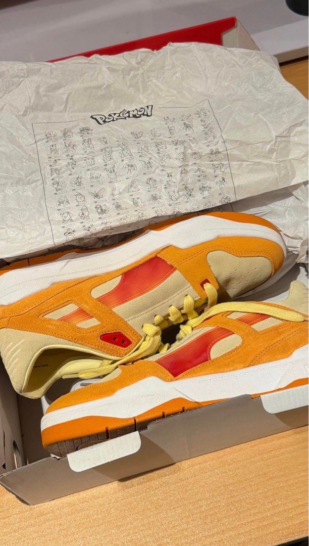 Puma x Pokemon Slipstream Charmander Sneakers (Category: Casual Shoes) located in Santa Maria. Submitted by itsvener (Listing ID 1462078797, Image 3). Description: - Puma x Pokemon Slipstream Charmander sneakers - Colorway: Pale Lemon and Orange - Size: US 10 / UK 9 / EUR 43 - Includes original box and packaging - Ideal for Pokemon and Puma collectors/fans.