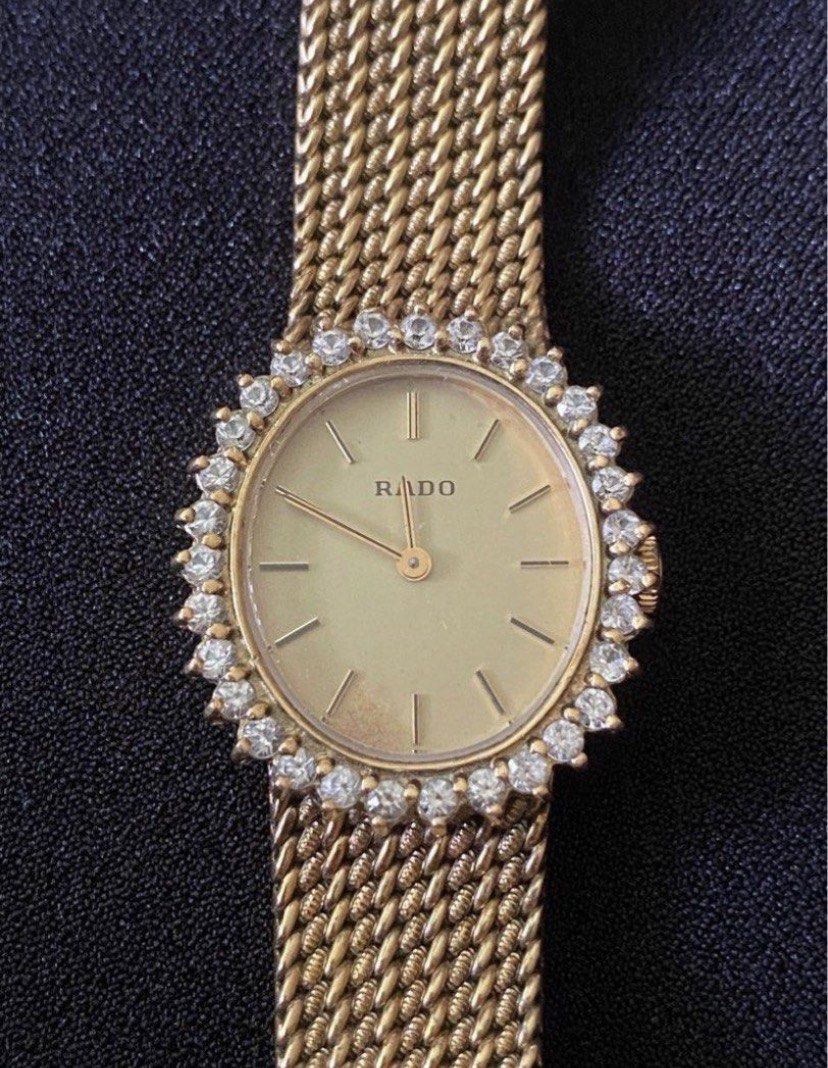 Rado Gold Tone Diamond Bezel Watch (Category: Women's Watches) located in Muntinlupa City. Submitted by bloo_berry (Listing ID 1462147772, Image 1). Description: - Vintage Rado Watch - Oval Face - Diamond Bezel - Gold Tone Mesh Strap - Model Number: 332.7757.2 - Serial Number: 15600373 - manual wind - Bracelet approximately 6 inches ₱26,850 Selling as is. This is a vintage watch from my personal collection and may no longer tell accurate time. Pl