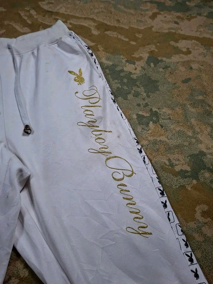 Rare three quarter playboy sidetape sweatpants (Category: Other Bottoms) located in Tagaytay City. Submitted by joyjavier1230 (Listing ID 1462101686, Image 3). Description: Rare three quarter playboy sidetape sweatpants In excellent condition No issues Medium on tag Waistline: 28"-34" Length: 28" Leg opening: 5" Mine: 350+ shipping fee Location: Tagaytay Dm to purchase 📩 📩 📩.