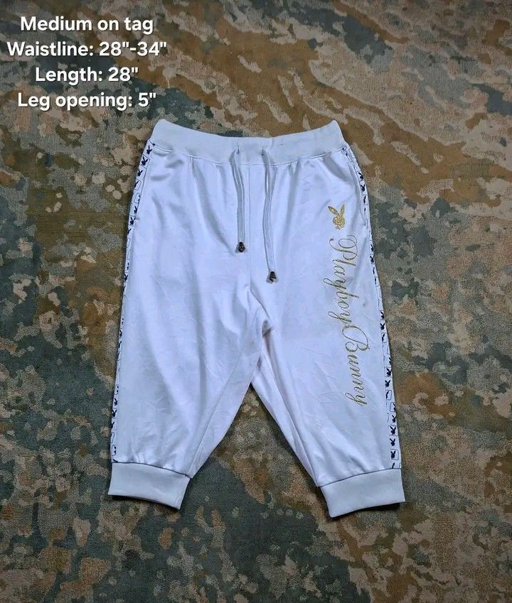 Rare three quarter playboy sidetape sweatpants (Category: Other Bottoms) located in Tagaytay City. Submitted by joyjavier1230 (Listing ID 1462101686, Image 1). Description: Rare three quarter playboy sidetape sweatpants In excellent condition No issues Medium on tag Waistline: 28"-34" Length: 28" Leg opening: 5" Mine: 350+ shipping fee Location: Tagaytay Dm to purchase 📩 📩 📩.