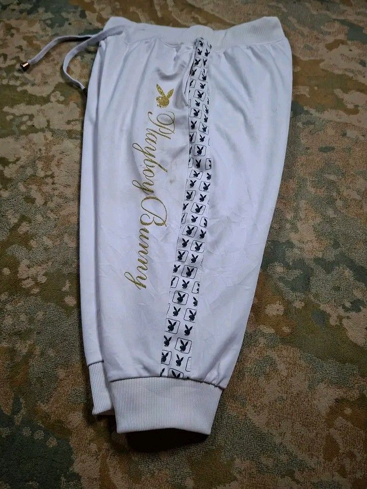 Rare three quarter playboy sidetape sweatpants (Category: Other Bottoms) located in Tagaytay City. Submitted by joyjavier1230 (Listing ID 1462101686, Image 2). Description: Rare three quarter playboy sidetape sweatpants In excellent condition No issues Medium on tag Waistline: 28"-34" Length: 28" Leg opening: 5" Mine: 350+ shipping fee Location: Tagaytay Dm to purchase 📩 📩 📩.