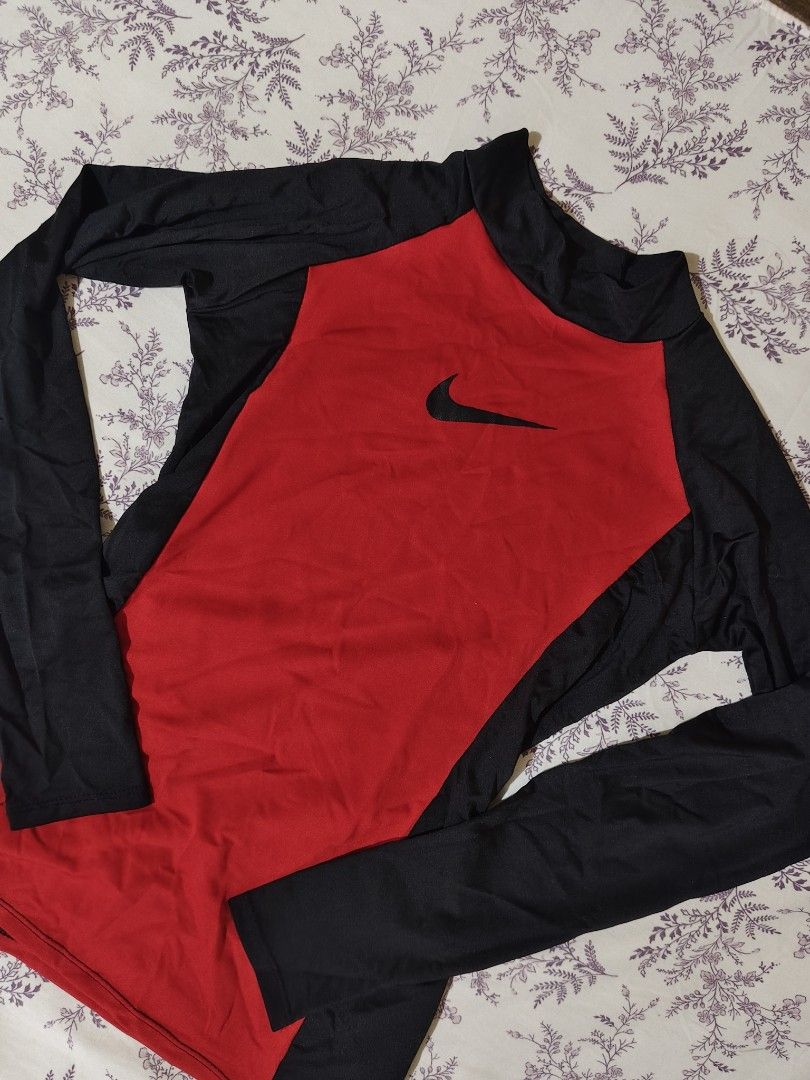 Rash guard red swimwear top (Category: Rash guard) located in Bulacan. Submitted by angel.decluttersx (Listing ID 1462130179, Image 3). Description: for xs-small size.