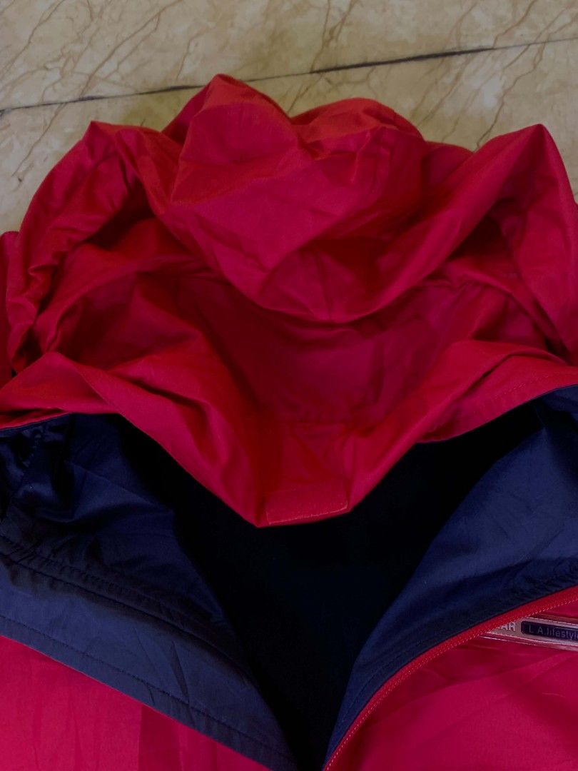 Red and Navy Hooded Windbreaker Jacket (Category: Coats, Jackets and Outerwear) located in Quezon City. Submitted by chic.on.a.dime (Listing ID 1462068173, Image 2). Description: - NO ISSUE - packable hood - Red windbreaker jacket - Hooded design with adjustable drawstrings - Zipper closure - Two side pockets - size: XL - Ideal for outdoor activities and casual wear GANDA NITO PROMISE!!! 🥰 NOTE: MANAGE YOUR EXPECTATIONS ‼️📢 - color may vary due