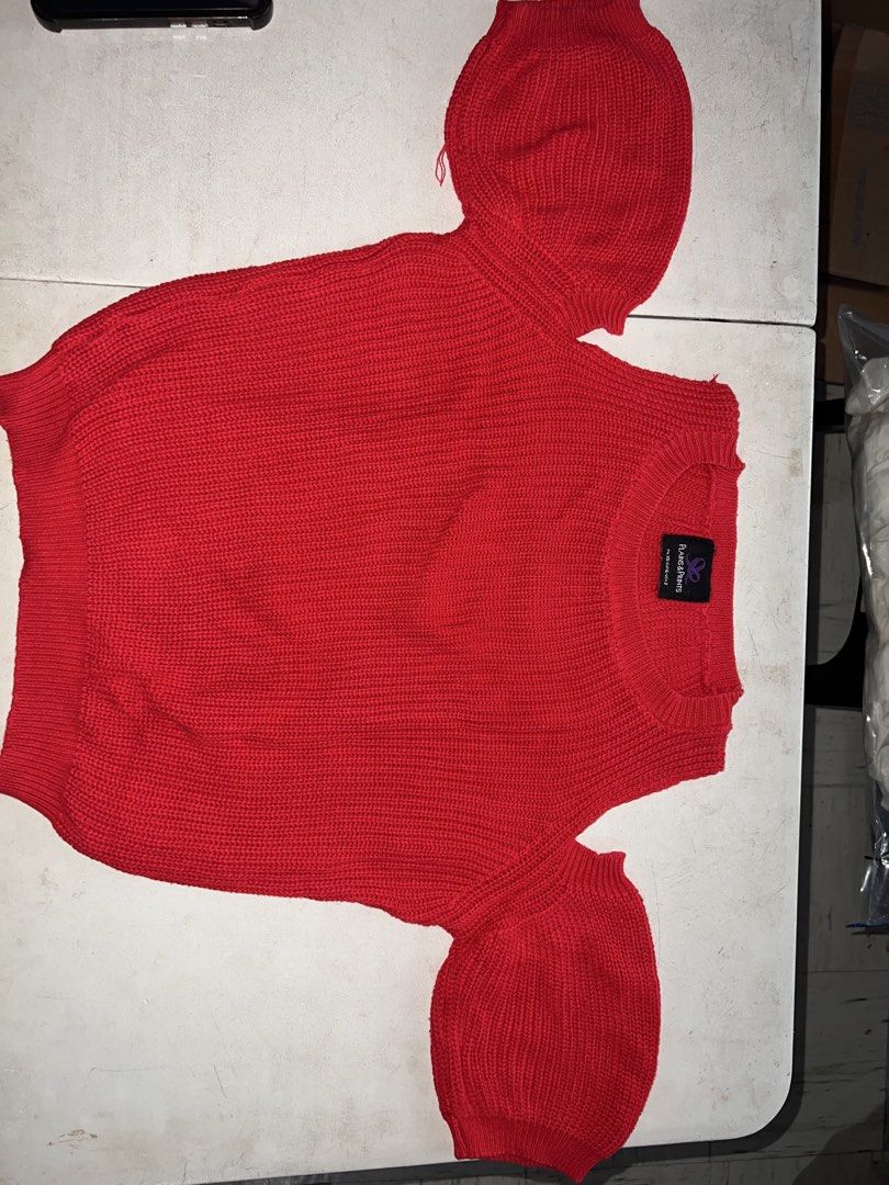 Red Knit Sweater with Puff Sleeves (Category: Others Tops) located in Manila. Submitted by charlotte.mae (Listing ID 1462101860, Image 2). Description: Cute red knit sweater. Features puff sleeves and a ribbed texture. Great for layering or wearing on its own. Easy to style with jeans or a skirt. Bundle.