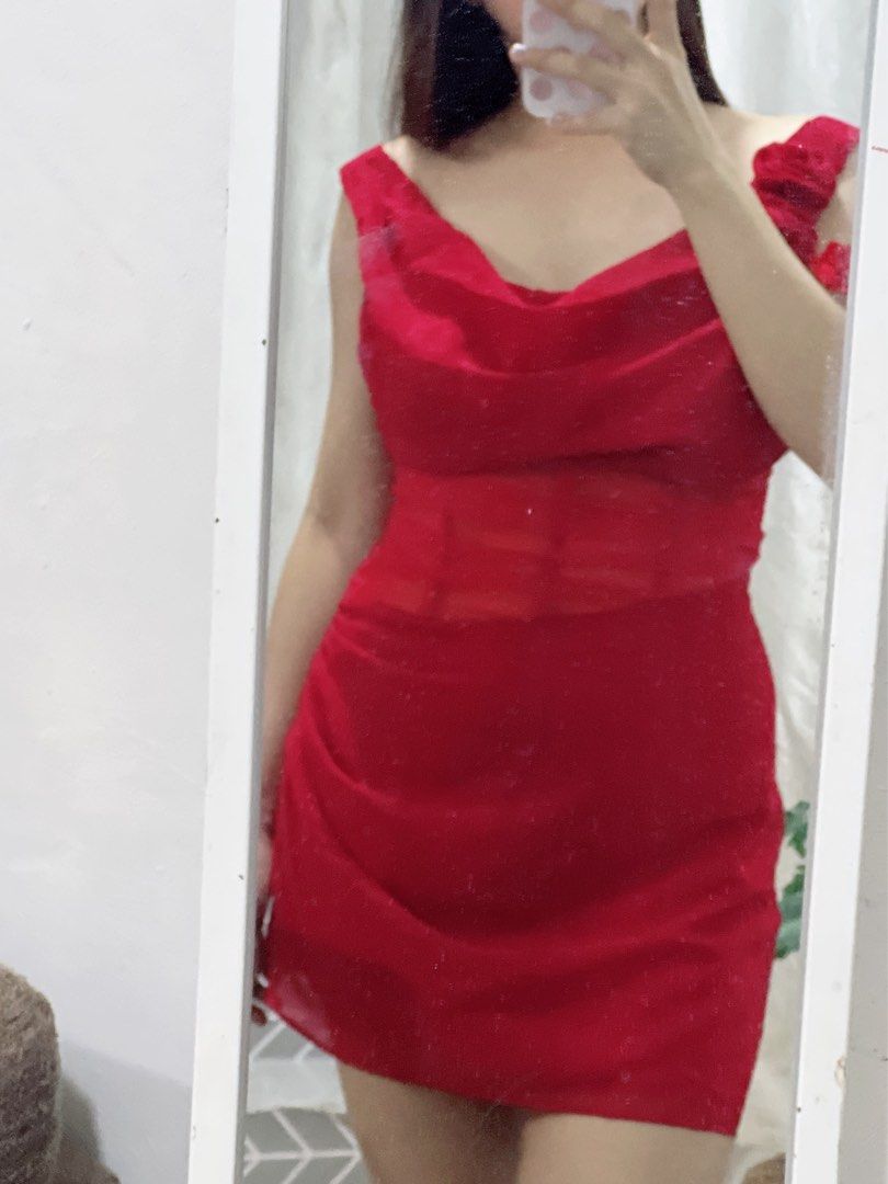 Red Mini birthday Dress (Category: Dresses) located in Cavite. Submitted by wishie_collects (Listing ID 1462255539, Image 3). Description: Design & Style: A glamorous, sleeveless mini dress featuring a soft cowl neckline. Bodice Detailing: It includes a structured, semi-sheer mesh panel at the waist with visible vertical boning for a corset-inspired effect. Skirt Silhouette: The lower portion of the dress is fitted with subtle ruching along the s