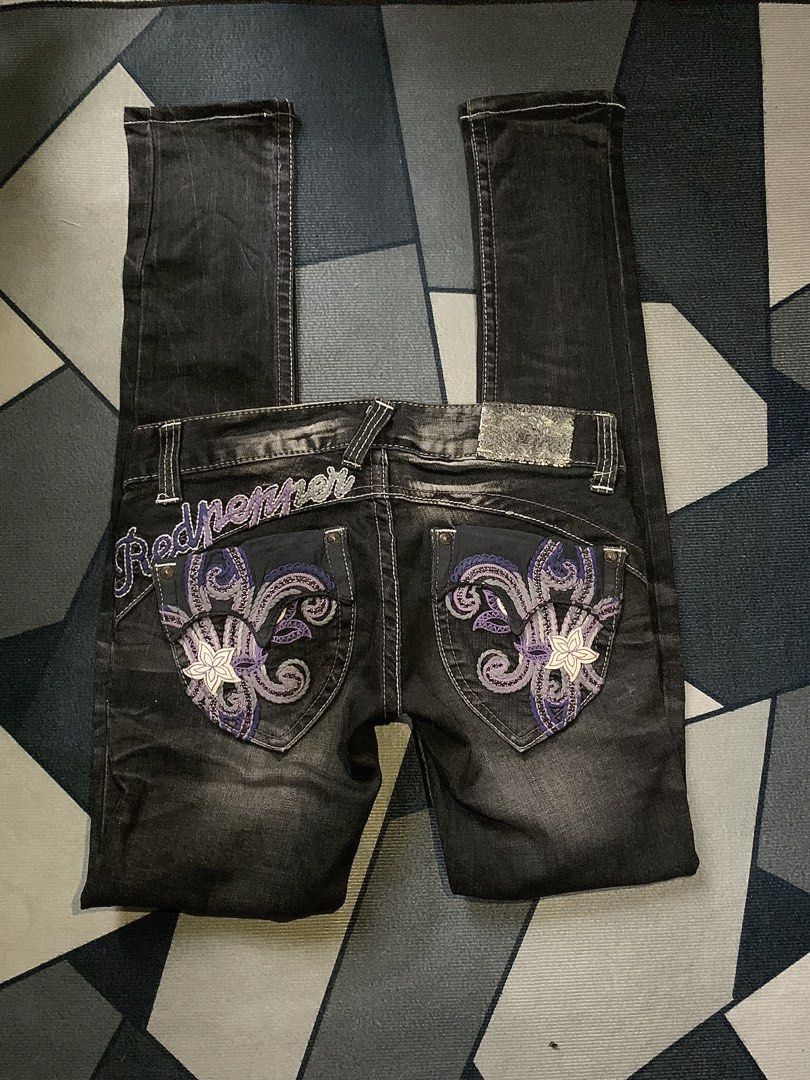 Red Pepper Black Embellished Jeans (Category: Jeans) located in Cebu City. Submitted by selamethrift (Listing ID 1462148701, Image 1). Description: - Brand: Red Pepper - Color: Black Denim - Design: Intricate purple and white floral embroidery on back pockets - Details: Embroidered brand name on back waistband, white contrast stitching throughout - Closure: Button and zip front - Style: Statement piece -Size: 24 on tag -see last slide for minimal