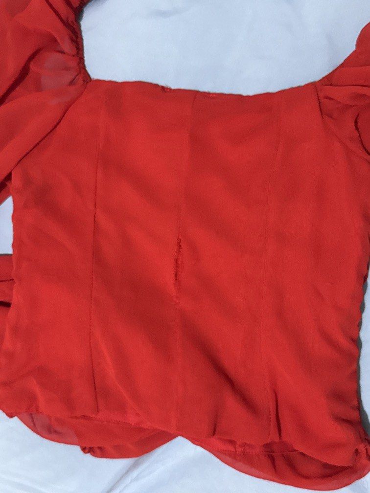 Red Trendyol Blouse (Category: Blouses) located in Manila. Submitted by jannine_closet (Listing ID 1462187085, Image 2). Description: With Stitching flaw at the back.