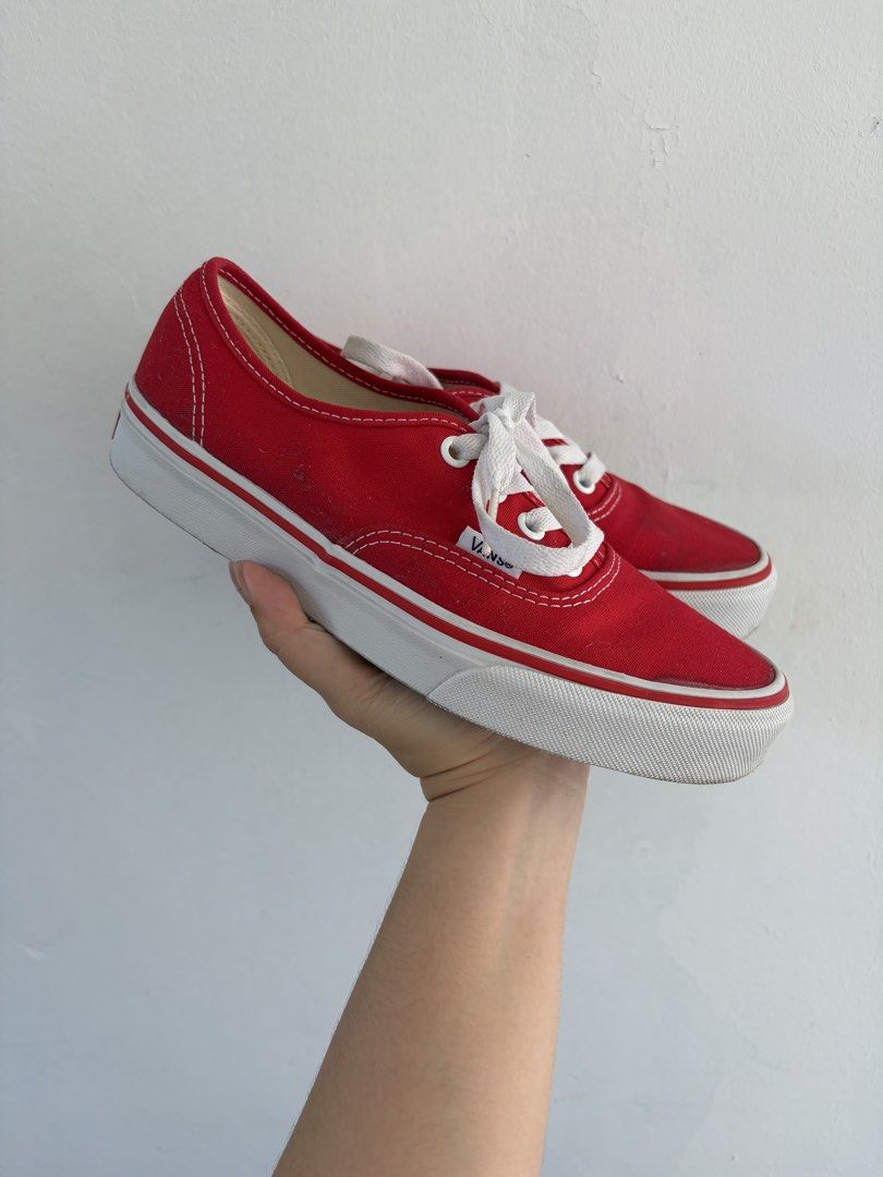 Red Vans Authentic Sneakers (Category: Sneakers) located in Manila. Submitted by nicaclare07 (Listing ID 1462124261, Image 3). Description: - Classic red Vans Authentic sneakers - Canvas upper with white laces - Signature rubber waffle sole - Minor scuffs on toe and sides - Soles show some wear, but plenty of life left - Perfect for everyday wear.