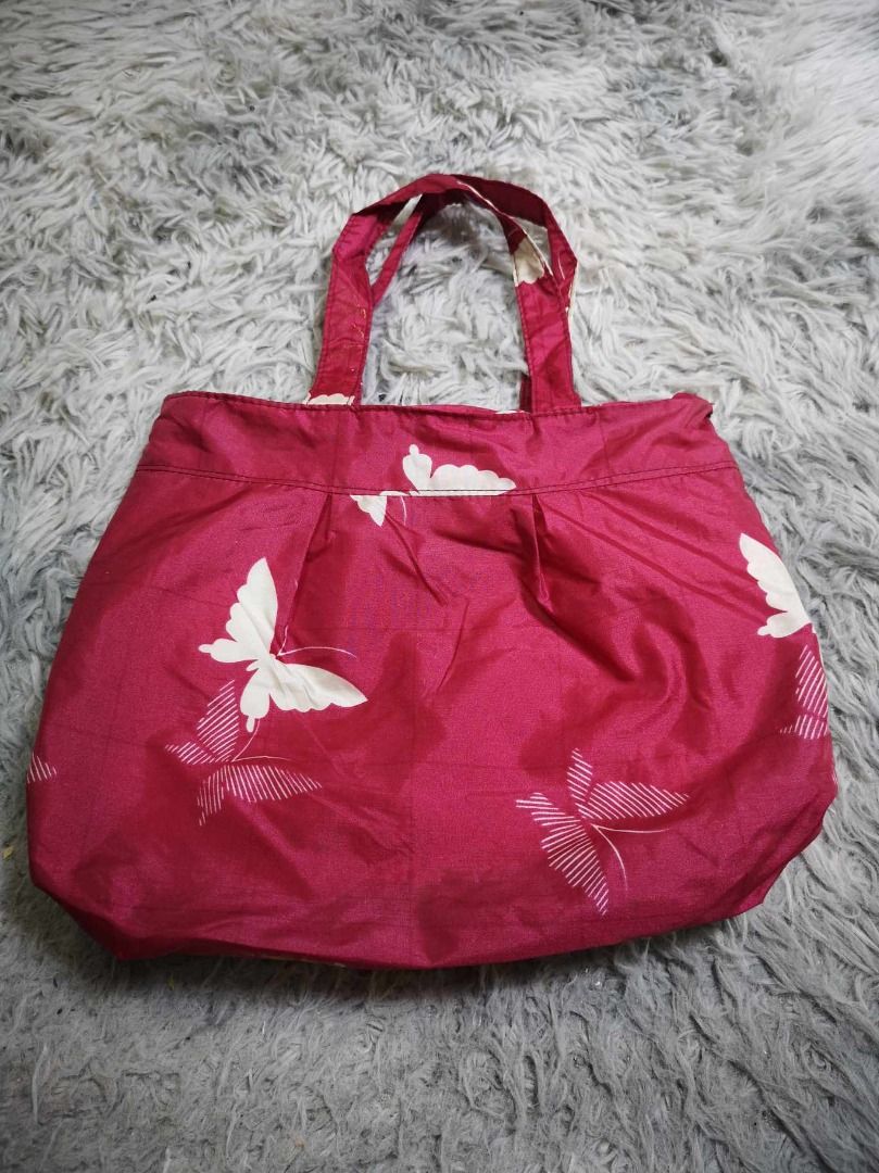 Red With White Butterfly Print Tote Bag (Category: Tote Bags) located in Santa Cruz. Submitted by jmy_surplus.2 (Listing ID 1462175406, Image 3). Description: Size ; L - 10.6 W - 12.5 Color ; Red Type ; Tote Bag Brand ; No brand Material ; nylon Style ; Red Durable Tote Bag LR 129 JMY 1 Batch #221.