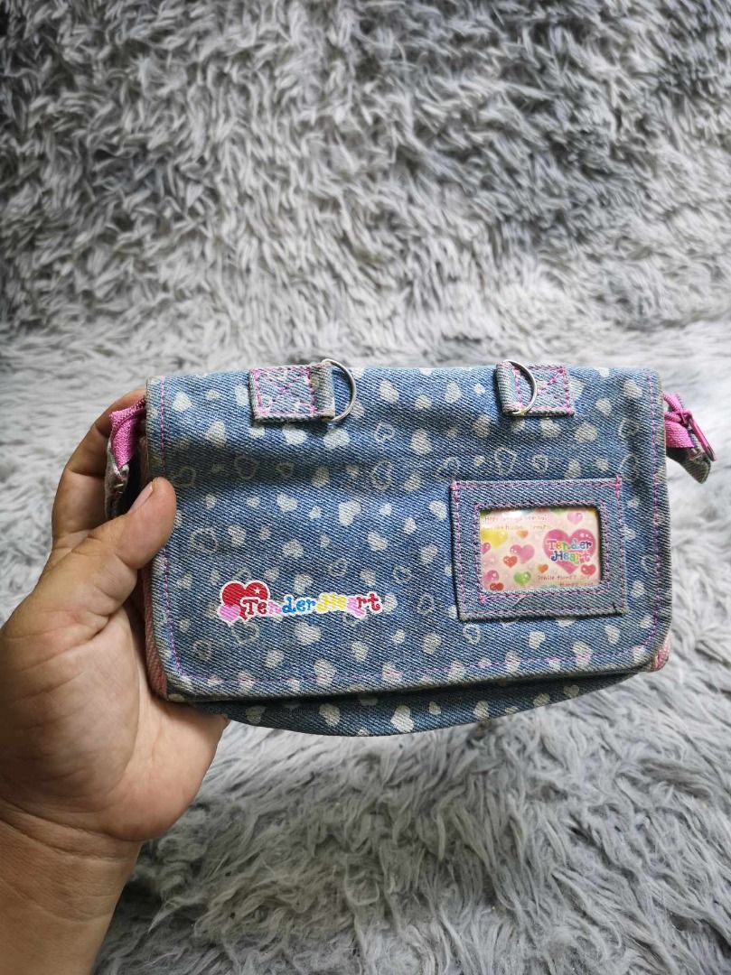 Retro Denim Heart Patterned Cosmetic Pouch (Category: Purses & Pouches) located in Santa Cruz. Submitted by jmy_surplus.2 (Listing ID 1462175803, Image 2). Description: Size ; L - 5.6 W - 8 Color ; Blue Type ; Cosmetic Pouch Brand ; No brand Material ; Denim Style ; Denim Flap Cosmetic Pouch LR 129 JMY 1 Batch #221.