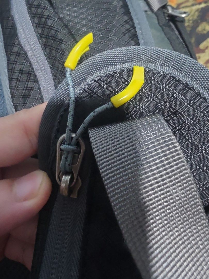 Rhinox Hiking Bag 45L (Category: Backpacks) located in Quezon City. Submitted by aldenpv (Listing ID 1462158826, Image 3). Description: Rhinox Hiking Bag 45L No issues with zipper except for the pull tab accessory (see third photo) but does not affect opening zipper Did not have any issue with fitting to airplane storage bin. Comes with waterproof reflecting cover RFS: Decluttering and upgrading.