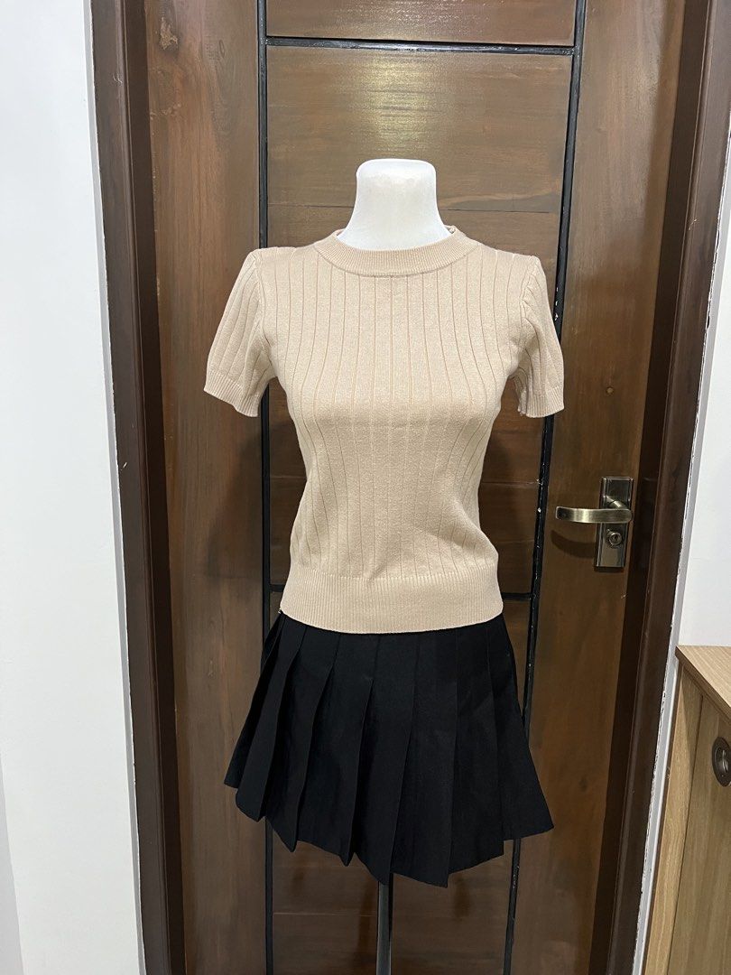 Ribbed Knit Short Sleeve Top - Beige (Category: Blouses) located in Angat. Submitted by yanacruise (Listing ID 1462052165, Image 1). Description: - Simple beige knit top - Short sleeves - Crew neck - All-over ribbed texture - Versatile: pairs well with skirts or pants - Easy to style for casual or dressier occasions.