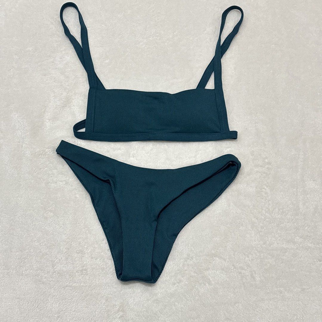Ribbed Teal Bikini Set (Category: Bikinis & Swimsuits) located in Bacoor. Submitted by jadiones (Listing ID 1462134678, Image 1). Description: - Ribbed teal bikini set - Top features adjustable straps and clasp closure - High-cut bottoms - Soft, stretchy, and comfortable material - Perfect for beach or pool days.