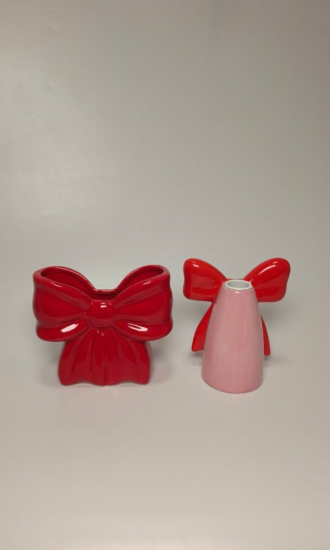 Ribbon candle holder and vase set (Category: Vases & Decorative Bowls) located in Cavite. Submitted by phtmt (Listing ID 1462196102, Image 2). Description: Ribbon vase & candle holder set Candle holder H 13cm Vase H 13 cm These are factory pull-out items, so minor imperfections or flaws may be present. Please manage your expectations..