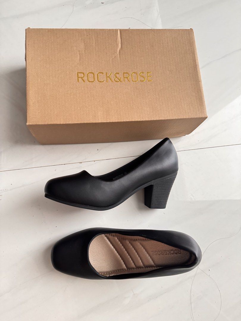 Rock & Rose Black Block Heels (Category: Heels) located in Cainta. Submitted by happydog.e97ed3 (Listing ID 1462052294, Image 1). Description: - Brand: Rock & Rose - Color: Black - Style: Classic block heel pumps - Features: Comfortable cushioned insole, moderate heel height for everyday wear - Includes: Original box - Original Price: P1299.00.