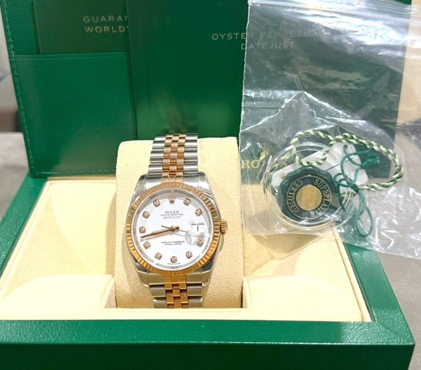 Rolex Datejust 36 2018"Everose Rolesor" (Category: Luxury Watches) located in Manila. Submitted by atty.jay (Listing ID 1462100801, Image 2). Description: Reference: 116231 Size: 36mm Dial: White Dial with Factory Diamond Markers set in 18k Everose gold settings Complete Origin: Purchased May 2018..