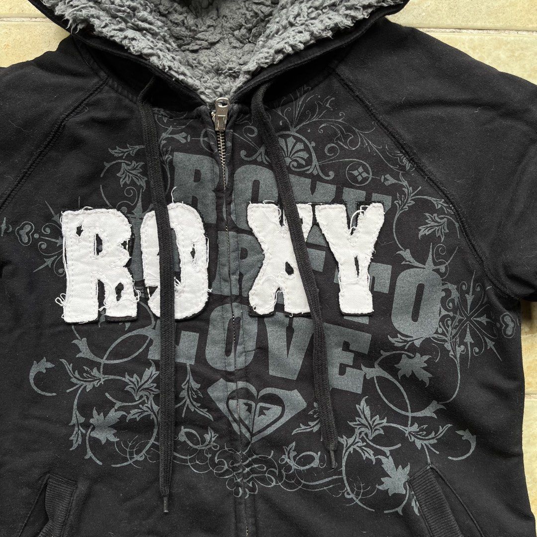 Roxy Dare to Love Reversible Lined Zip Up Hoodie (Category: Coats, Jackets and Outerwear) located in Quezon City. Submitted by chikinita (Listing ID 1462091925, Image 2). Description: -Heavyweight - Black Roxy hoodie - Sherpa-lined hood for extra warmth - Features Roxy logo and floral graphic on the front - Full zip closure with durable YKK zipper - Adjustable drawstrings for the hood - Convenient front pockets - Ideal for staying warm and stylis
