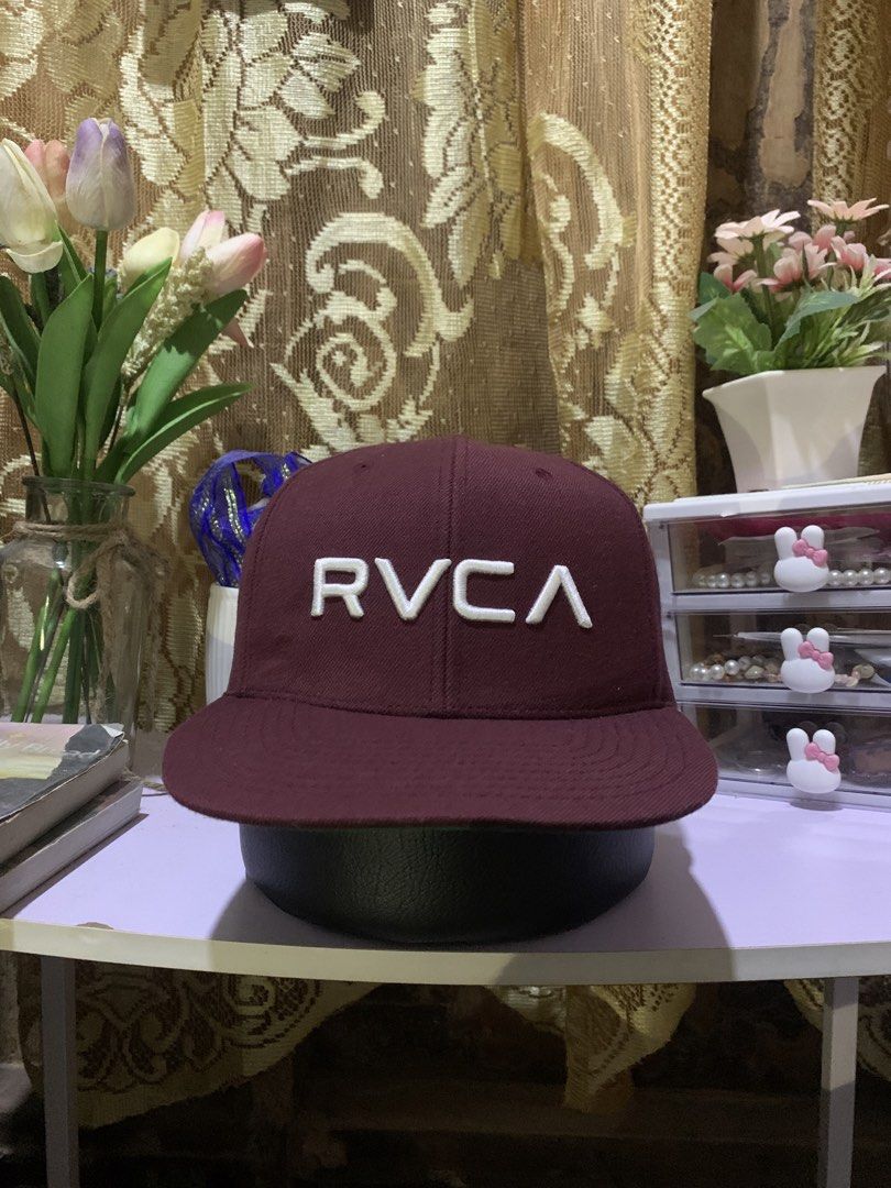 RVCA Snapback Cap Burgundy Green Underbrim (Category: Caps & Hats) located in Quezon. Submitted by ken2x_thrift (Listing ID 1462081466, Image 1). Description: - Classic RVCA snapback hat - Burgundy color with green underbrim - Simple and clean design - Adjustable strap for a custom fit - Perfect for everyday wear.