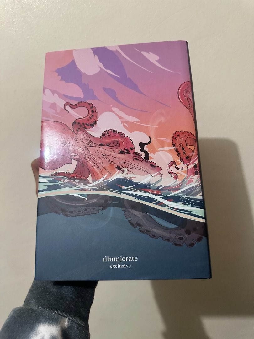 Saltswept Illumicrate Edition (Category: Storybooks) located in Pasay City. Submitted by library_hecate (Listing ID 1462155463, Image 3). Description: • Exclusive Redesigned Cover: Features exclusive cover art designed by @stephcuff_creative with art from @alterlier. • Hardcase Design: Full-color artwork on the hardback book case with foil details by @artofmaxinevee. • Digitally Printed Edges: Custom sprayed and digitally printed edges on all thr