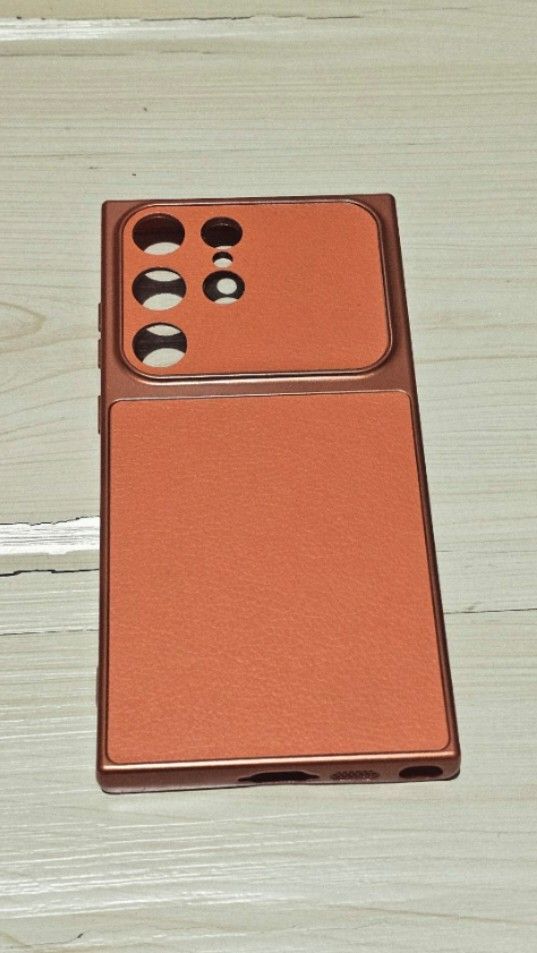 Samsung s23 ultra Orange Case (Category: Cases & Sleeves) located in Quezon City. Submitted by hub.store (Listing ID 1462252959, Image 3). Description: - Specifically designed for Samsung S23 Ultra - Vibrant orange color - Matte textured back for grip - Raised camera protection - Sleek and stylish design.