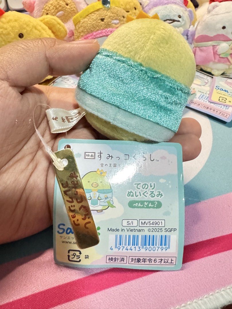 San-X Sumikko Gurashi Plush Penguin (Category: Plushies & Soft Toys) located in Caloocan City. Submitted by heeynahsbliss (Listing ID 1462061534, Image 2). Description: - Cute yellow chick plush toy - From San-X's Sumikko Gurashi collection - Includes original tags - Features a small gold charm - Made in Vietnam - Perfect for collectors and fans of cute characters.