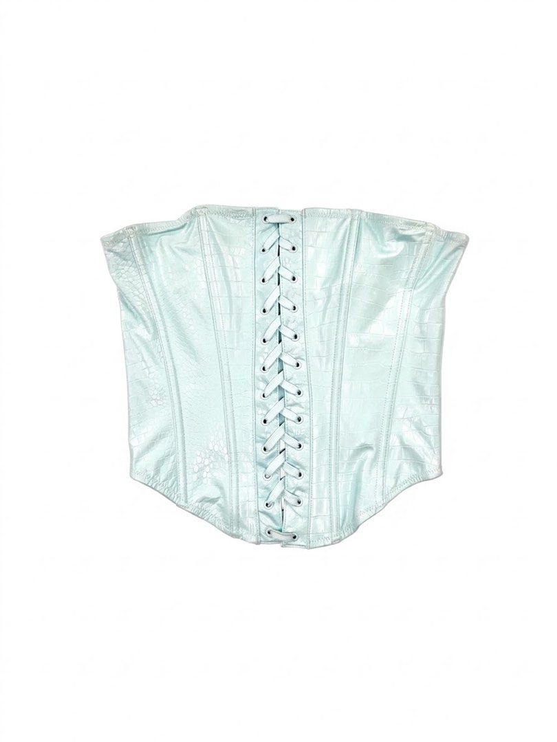 Savage X Ice Blue Croc Leather Corset (Category: Others Tops) located in Angeles City. Submitted by fruits.ph (Listing ID 1462134839, Image 1). Description: Measurements B:13.5”-15” W:11”-12.5” L:13.5” Size on Tag: ❌ Best Fit: S-M *Flat lay measurements* Mannequin Size: M (34”; 25”) Color Rate: 8/10 Flaws: light stain, barely noticeable ( See photos attached) Fabric Type: Synthetic Croc Skin/ Stretchable Fabric ***Color may vary due to lighting. 